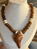 recycled brown glass with large shell
